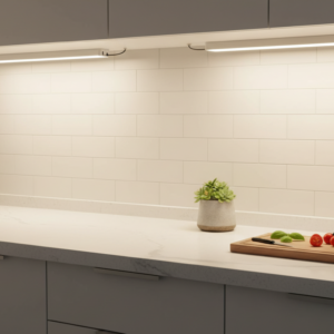 Rechargeable motion sensor under cabinet lighting illuminating kitchen countertop
